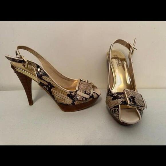 Michael Kors Shoes - Step up your shoe game with Michael Kors' stunning snakeskin heels